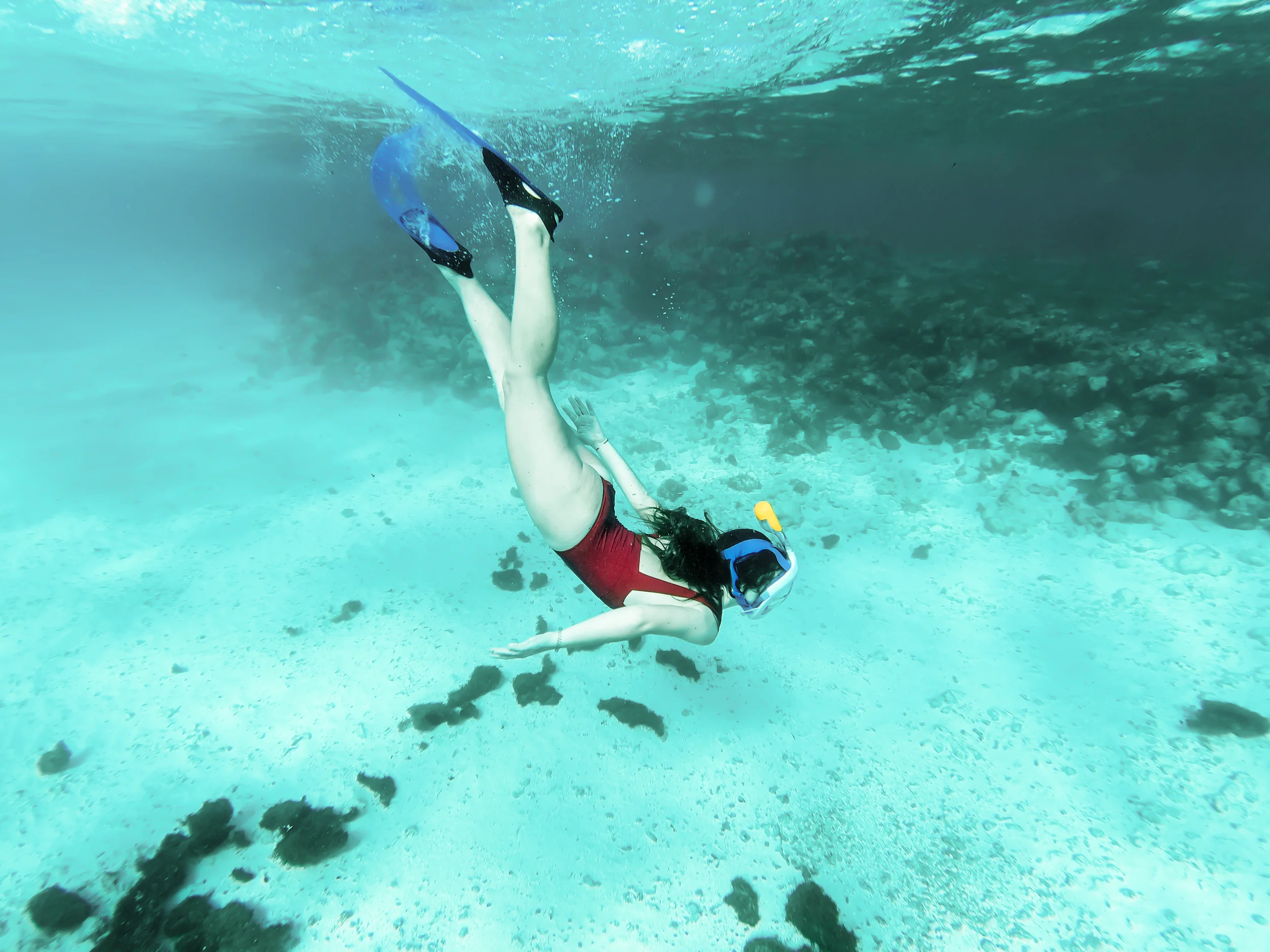 Woman diving underwater